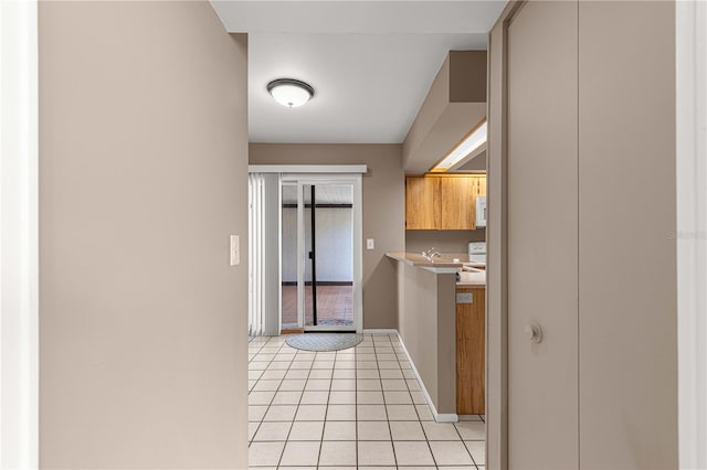 kitchen with light tile patterned floors