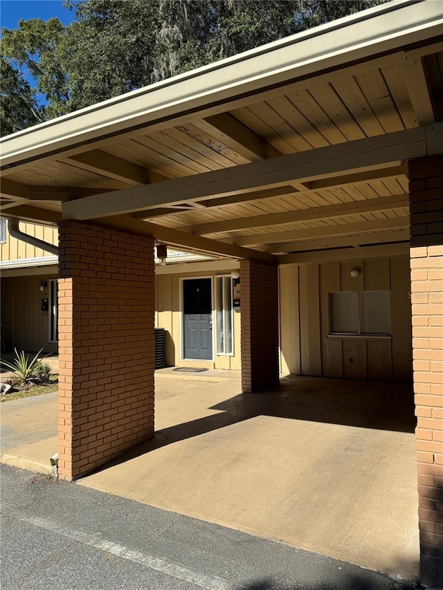 507 NW 39th Rd Unit 159, Gainesville, FL 32607 - view of patio / terrace featuring an attached carport