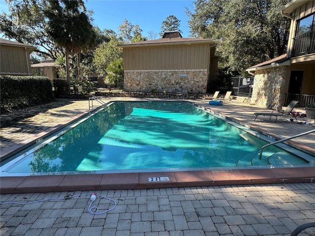 view of pool with a patio