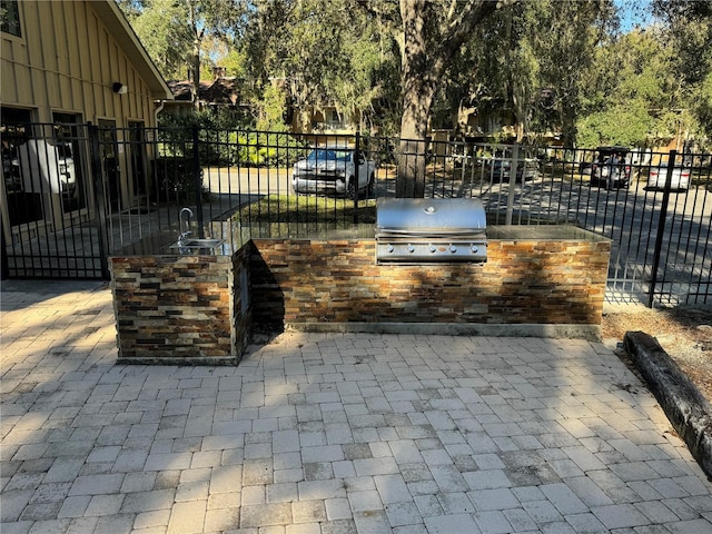 view of gate featuring sink