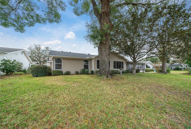 view of front facade with a front yard