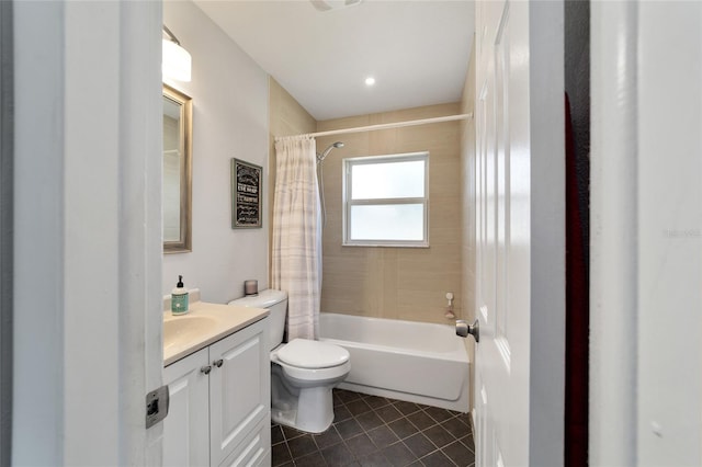 full bathroom featuring shower / bath combination with curtain, vanity, and toilet