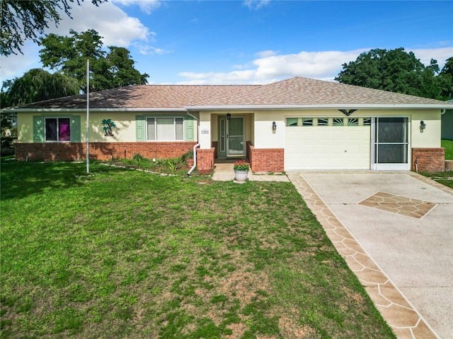 single story home featuring a front yard and a garage