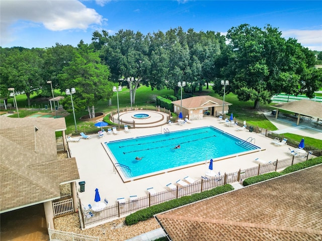 view of swimming pool featuring a patio area