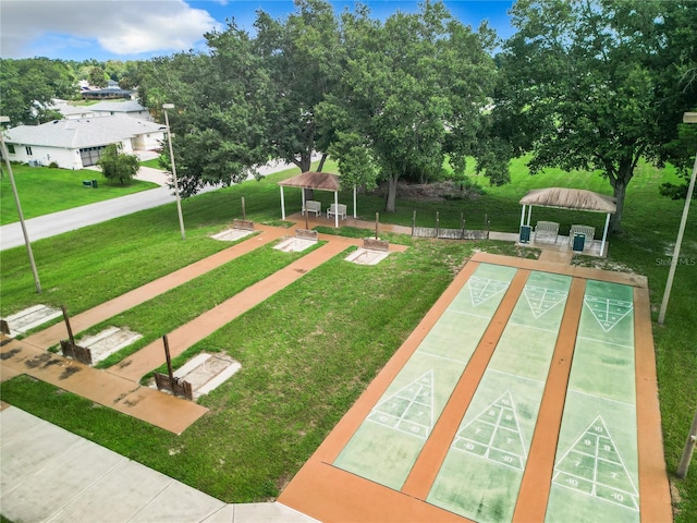 view of home's community with a gazebo and a lawn