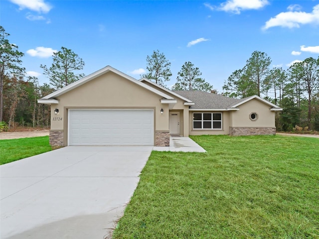 single story home with a front lawn and a garage