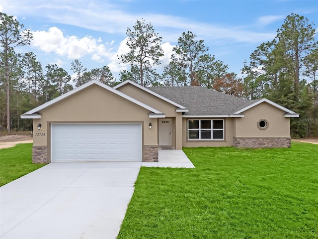 single story home with a garage and a front yard