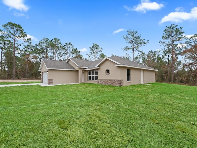 exterior space with a lawn and a garage