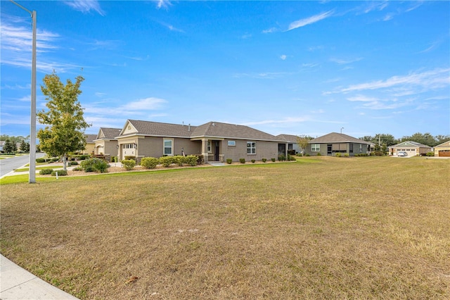 view of front of home featuring a front yard