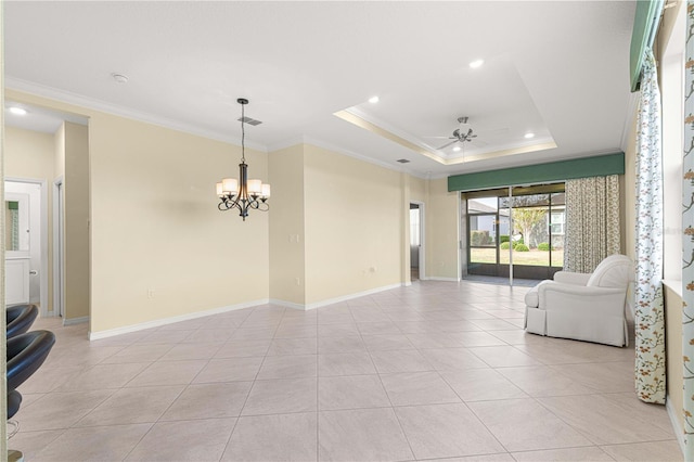 tiled living room featuring ceiling fan with notable chandelier, crown molding, and a tray ceiling