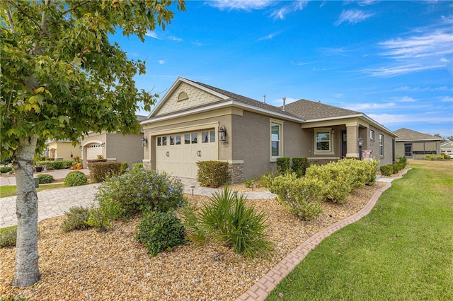 single story home featuring a front yard and a garage