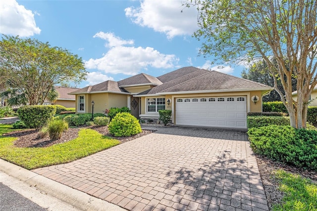 single story home with a garage