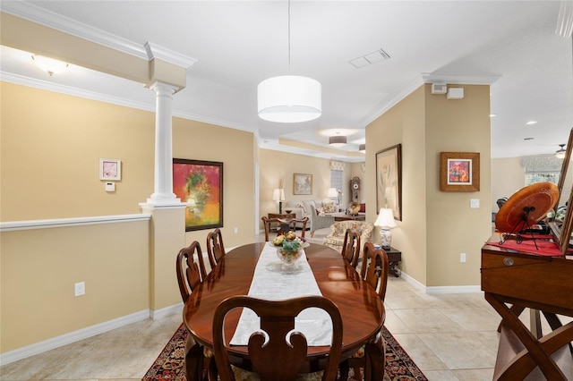 dining area with decorative columns, light tile patterned floors, and ornamental molding