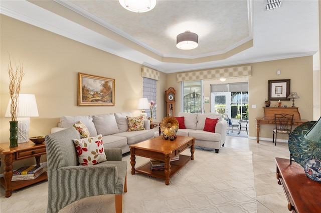 living room featuring a raised ceiling, crown molding, and light tile patterned floors