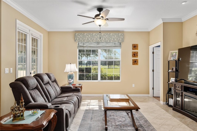 living room featuring ceiling fan and ornamental molding