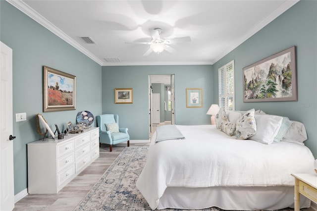 bedroom with ceiling fan, light hardwood / wood-style flooring, and ornamental molding