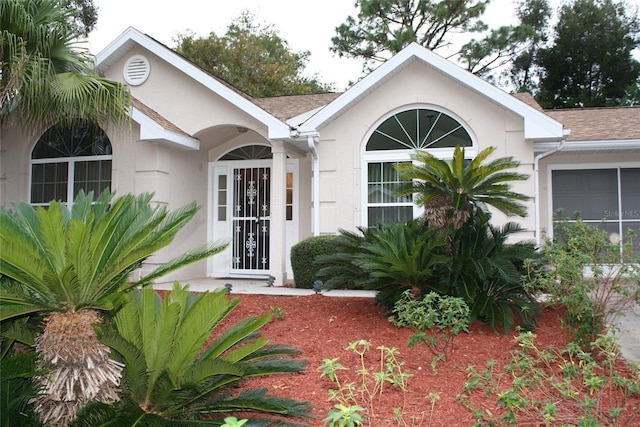 property entrance with a garage