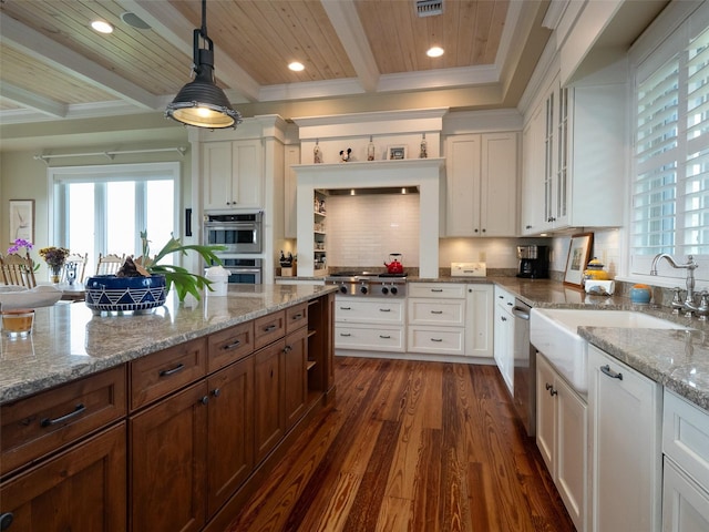 kitchen with dark wood-type flooring, decorative light fixtures, white cabinetry, stainless steel appliances, and wood ceiling