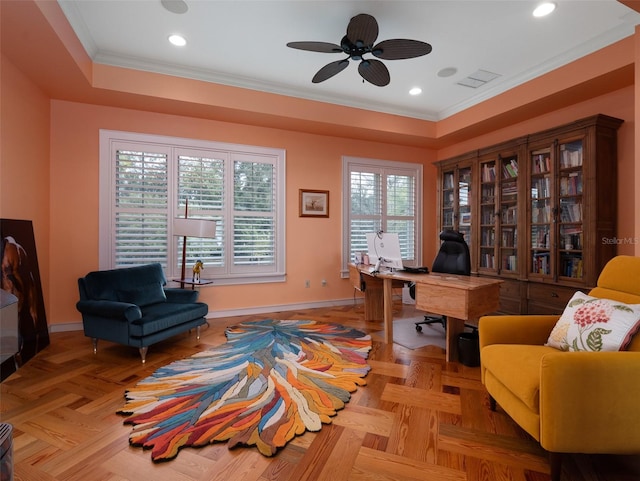 office space featuring crown molding, light parquet floors, and ceiling fan