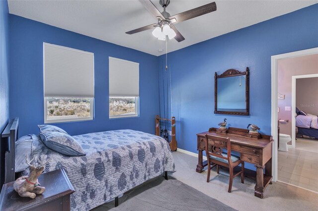 bedroom with carpet, baseboards, and ceiling fan