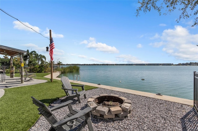 property view of water featuring an outdoor fire pit