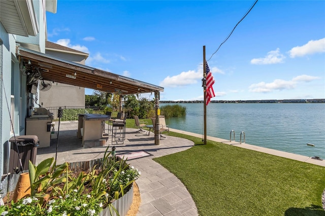 view of patio featuring a water view