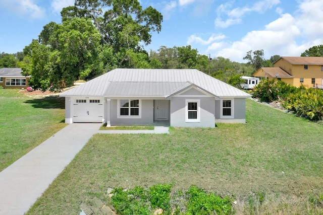 ranch-style house featuring a garage and a front lawn