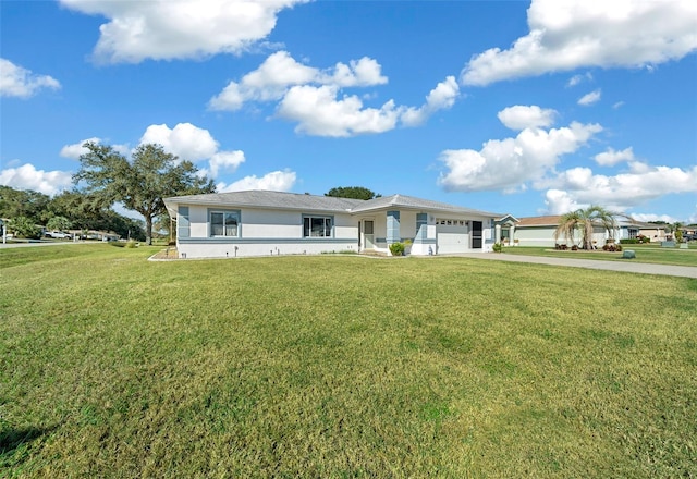 single story home with a garage and a front lawn