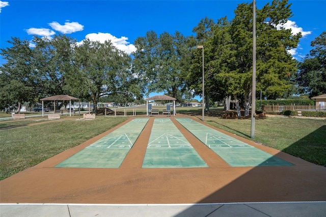 view of community with a gazebo and a lawn