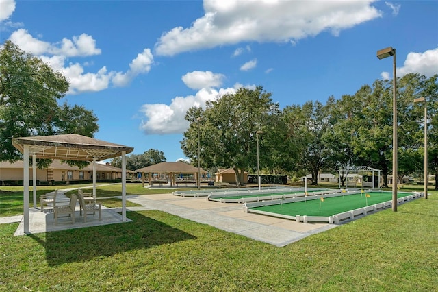 surrounding community featuring a gazebo and a yard