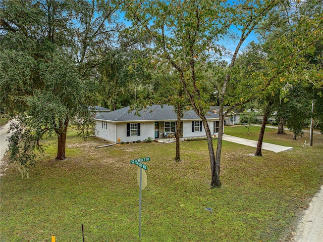 ranch-style house with a front lawn