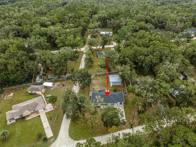 bird's eye view with a view of trees