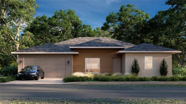 view of front of property featuring a garage