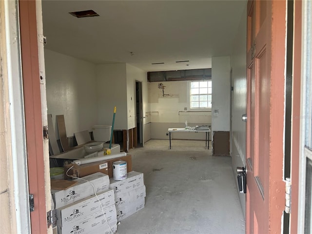 bathroom featuring concrete floors