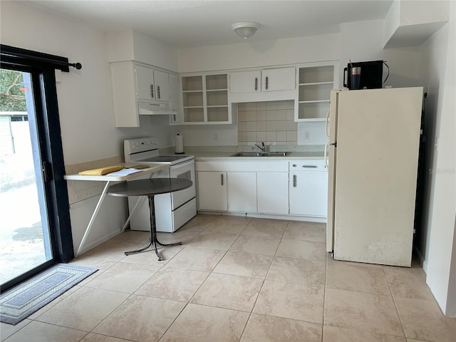 kitchen featuring decorative backsplash, white appliances, white cabinetry, and sink