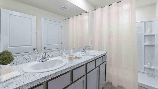 5085 SW 51st Rd, Gainesville, FL 32608 - full bathroom with double vanity and a shower with shower curtain