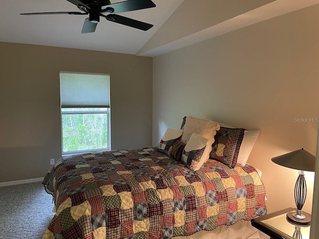 bedroom with carpet flooring, ceiling fan, and lofted ceiling