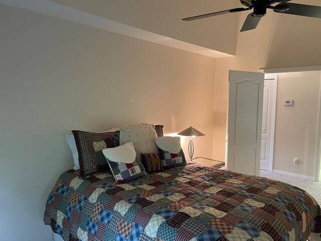 bedroom with ceiling fan and carpet