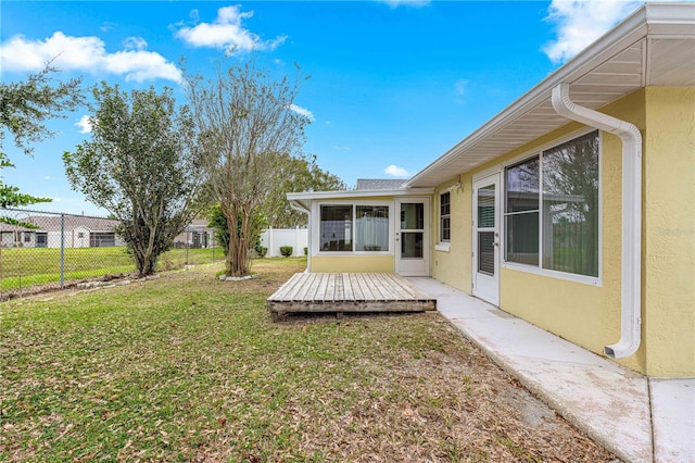 view of yard with a wooden deck