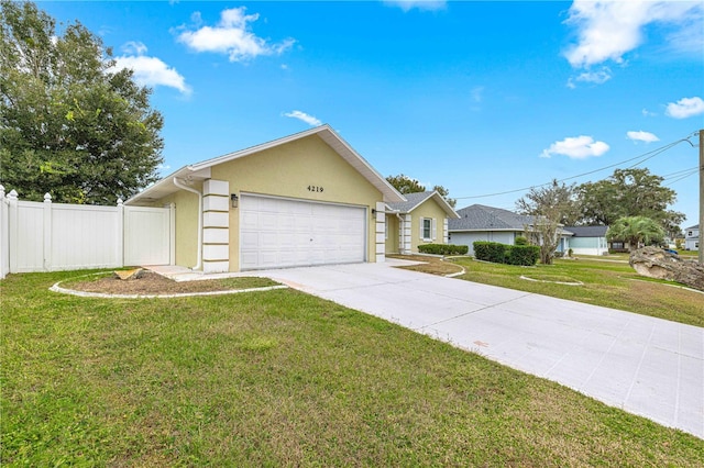 ranch-style house with a garage and a front lawn