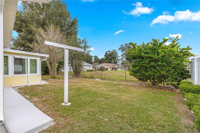 view of yard featuring fence