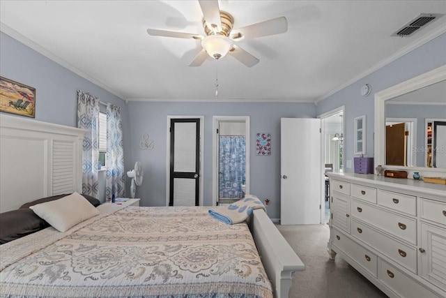 bedroom featuring carpet floors, ceiling fan, and crown molding