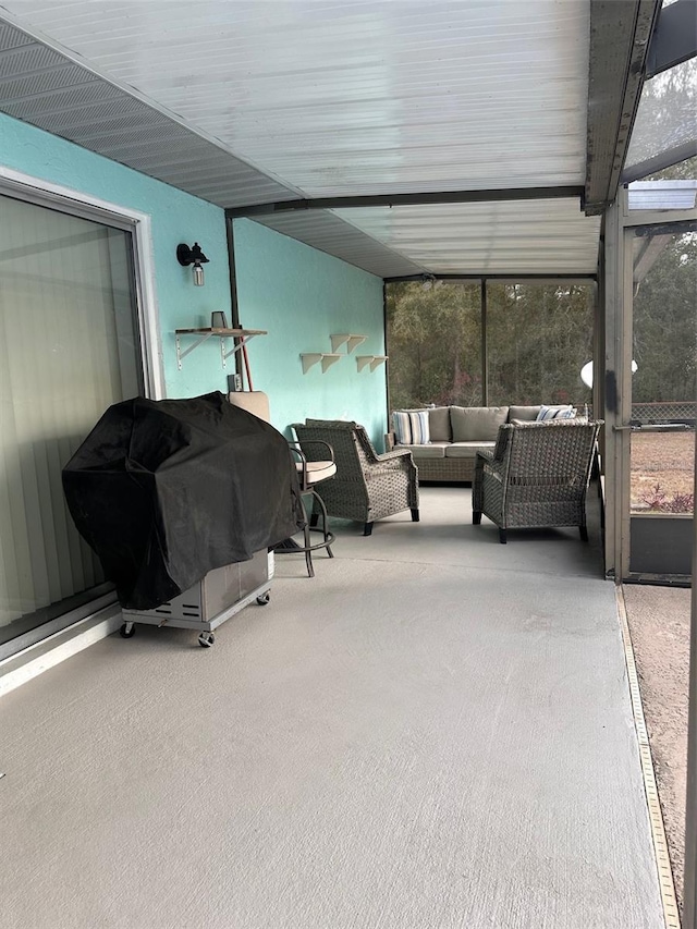 sunroom / solarium featuring a healthy amount of sunlight