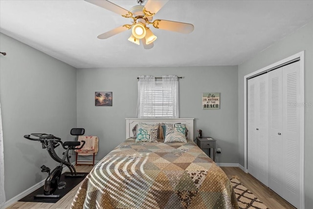 bedroom with ceiling fan, a closet, and light wood-type flooring