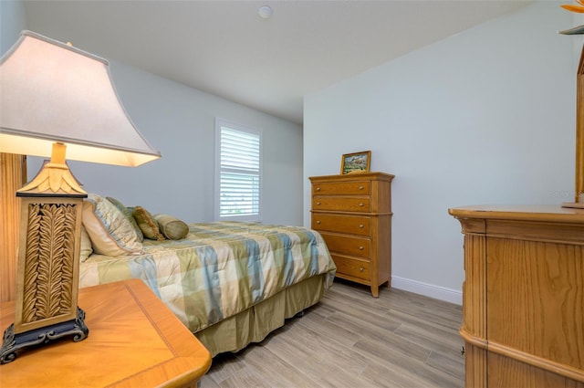 bedroom featuring hardwood / wood-style flooring