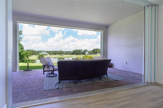 view of patio / terrace with a water view