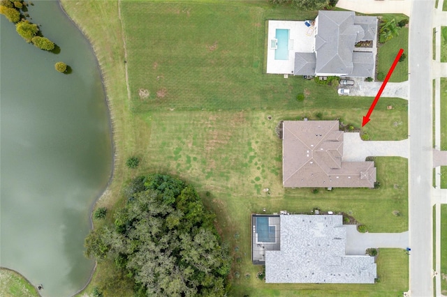 bird's eye view with a water view