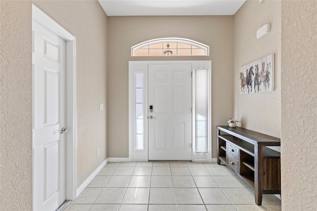 view of tiled foyer entrance