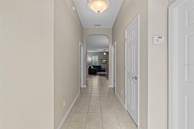 hallway with light tile patterned flooring