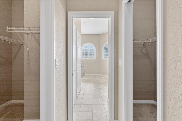 bathroom with tile patterned floors